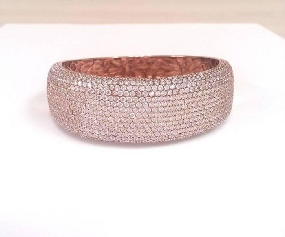 Approx total weight: 16.00 cts
Diamond Color: E-F
Diamond Clarity: Vs 
Cut: Excellent 
 We can make this bangle in white or yellow gold as well. 
If you would like to see a video of this lovely piece please send us a message and we will be glad to