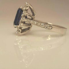 Emerald Cut Diamond and Rich Blue Sapphire Ring