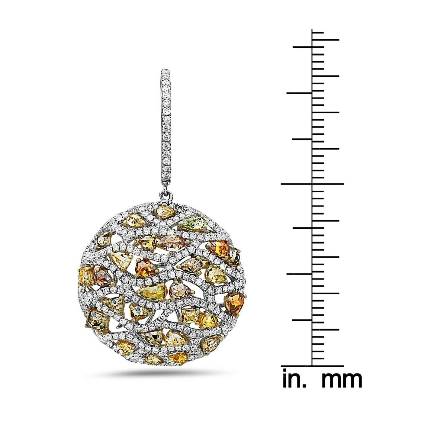 Approx total weight: 7.16 cts
Diamond Color: Fancy yellow, orange, green diamonds. 
Diamond Clarity: Vs 
All pieces come with a professional appraisal from GAL, a reputable lab accepted by most insurance companies which will include the retail value