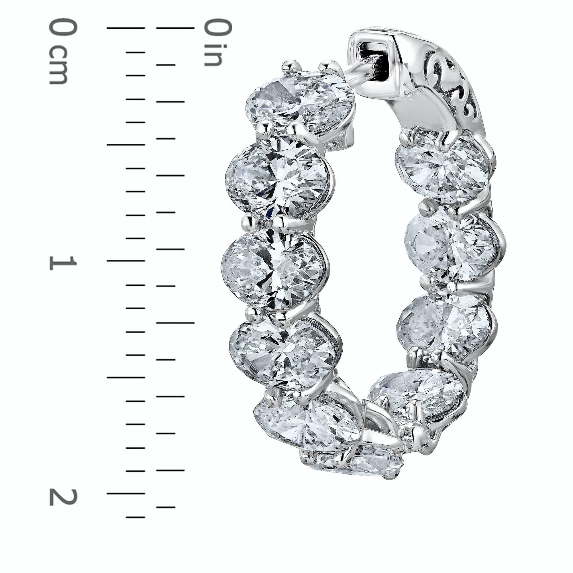 Unique Oval Shaped Diamonds Set in our one and only hand made diamond hoops. In addition to the diamonds being oval shaped, we also made this earring oval so that the inside diamonds would be even more visible. 
Approx total weight: 6.05ct
Diamond