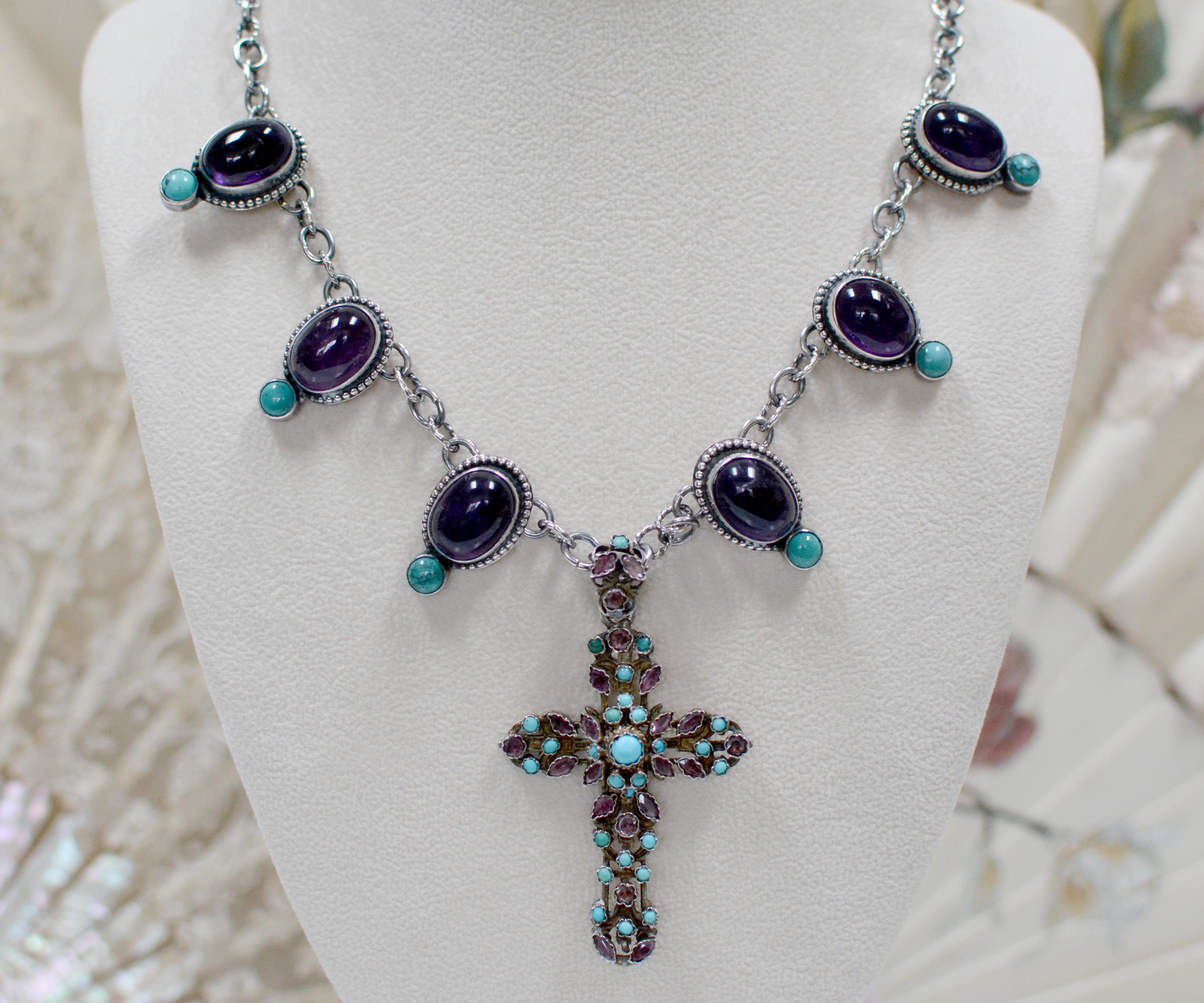 At the center of this refined Bohemian necklace is an iconic mid 1800's Austro Hungarian amethyst and turquoise Bishop's cross measuring 2.88
