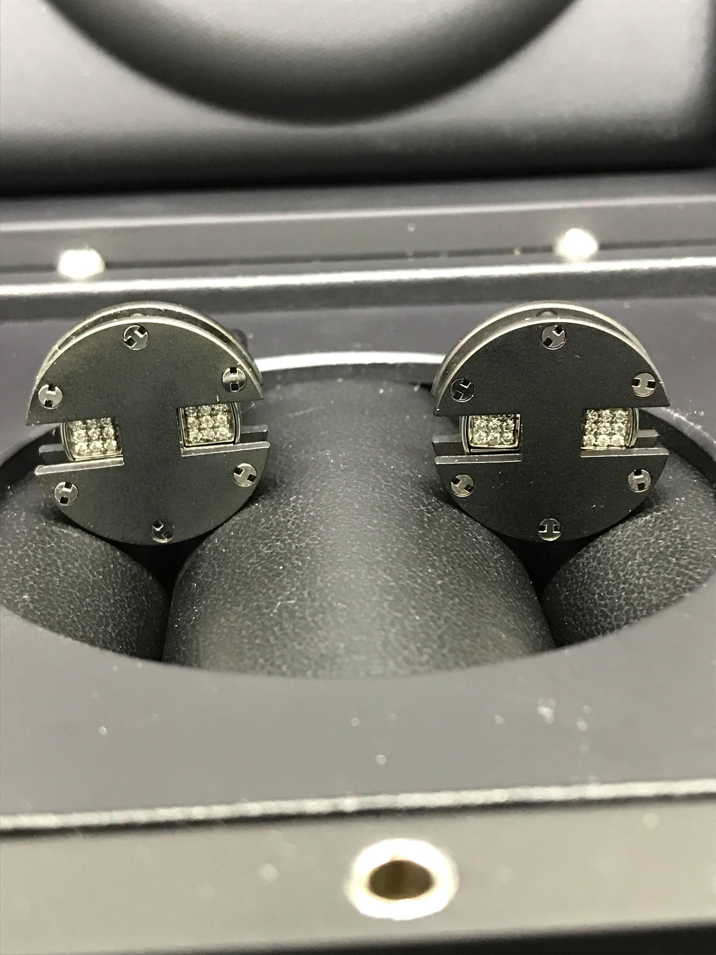 HUBLOT King Power Cuff links

Model number: BM.02.SX-0001

Brand New

Comes with original Hublot box and warranty

Black titanium

Rotating to show diamonds or steel

Perfect match to any Hublot Big Band or King Power watch

Retails for $2,900!!!