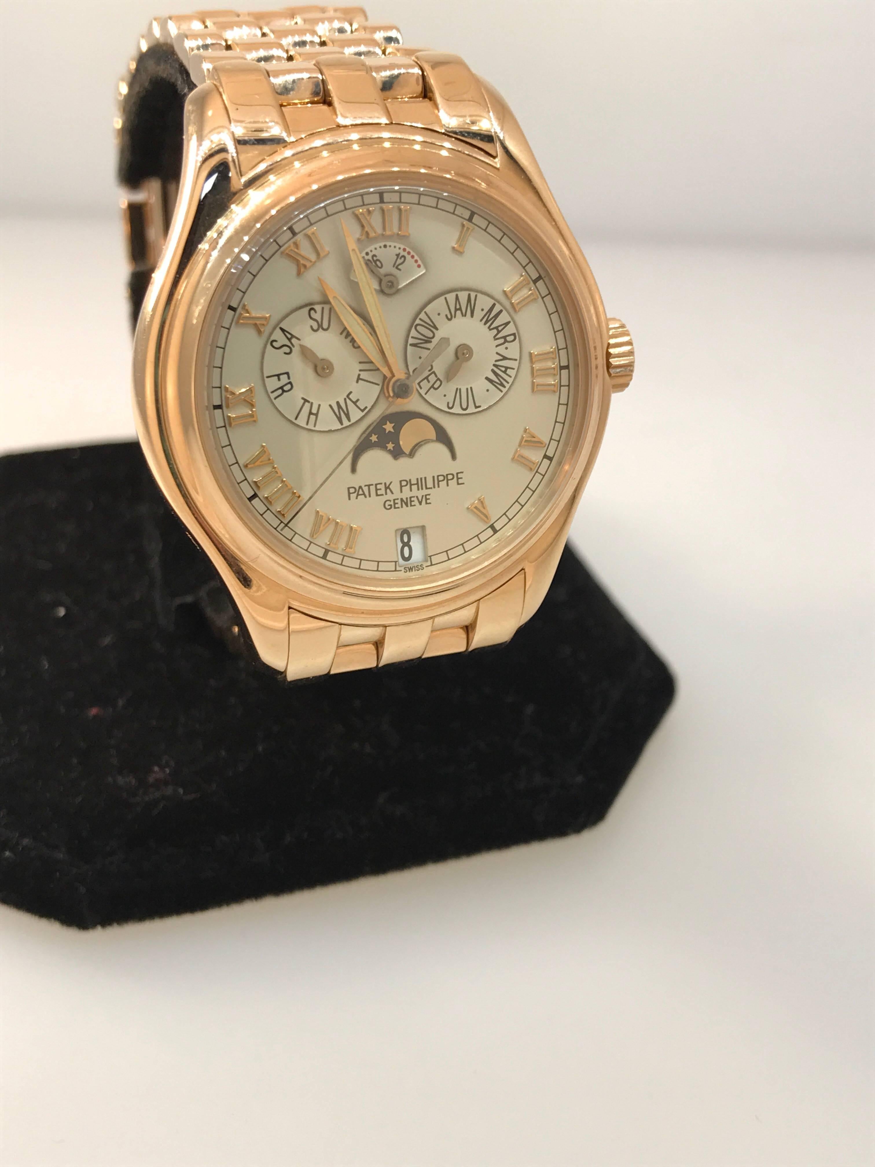 Patek Phillippe Annual Calendar Moonphase Men's watch

Model number 5036/1R

100% Authentic

PRE-OWNED 

Comes with Patek Phillipe box, leather pouch and manual (warranty is missing)

18 karat rose gold case and bracelet

Scratch resistant sapphire