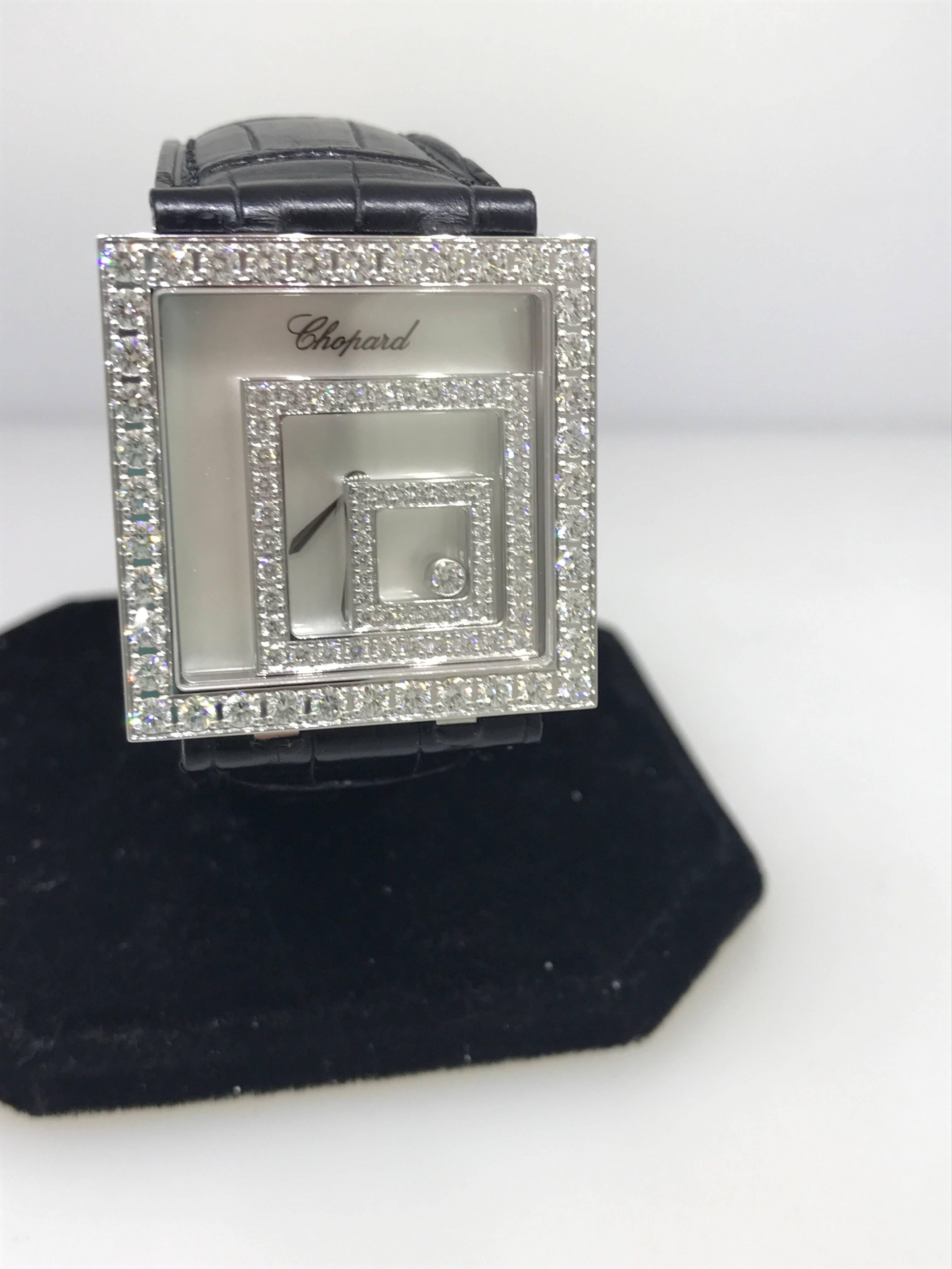 Chopard Happy Spirit Square Ladies Watch

Model Number: 20/7196-1001

100% Authentic

Brand New

Comes with original Chopard box, certificate of authenticity and warranty, and instruction manual

18 Karat White Gold

100 Diamonds total on the case