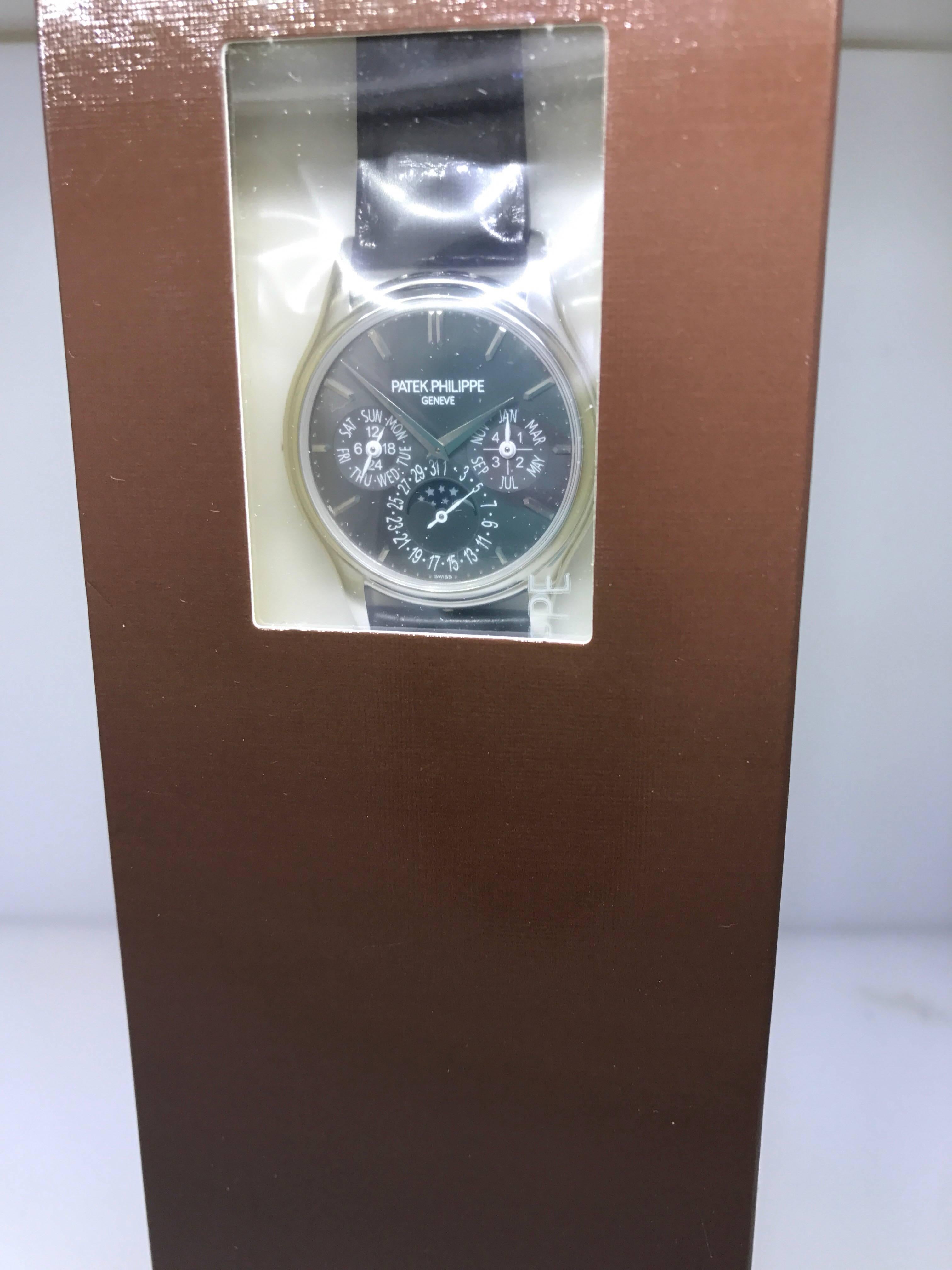 Patek Phillipe Perpetual Calendar Men's Watch

Model Number: 5140P-017

100% Authentic

Brand New - Double Sealed

Comes with original Patek Phillipe box, warranty, and instruction manual

Platinum Case and buckle

Gray dial and subdials

Case