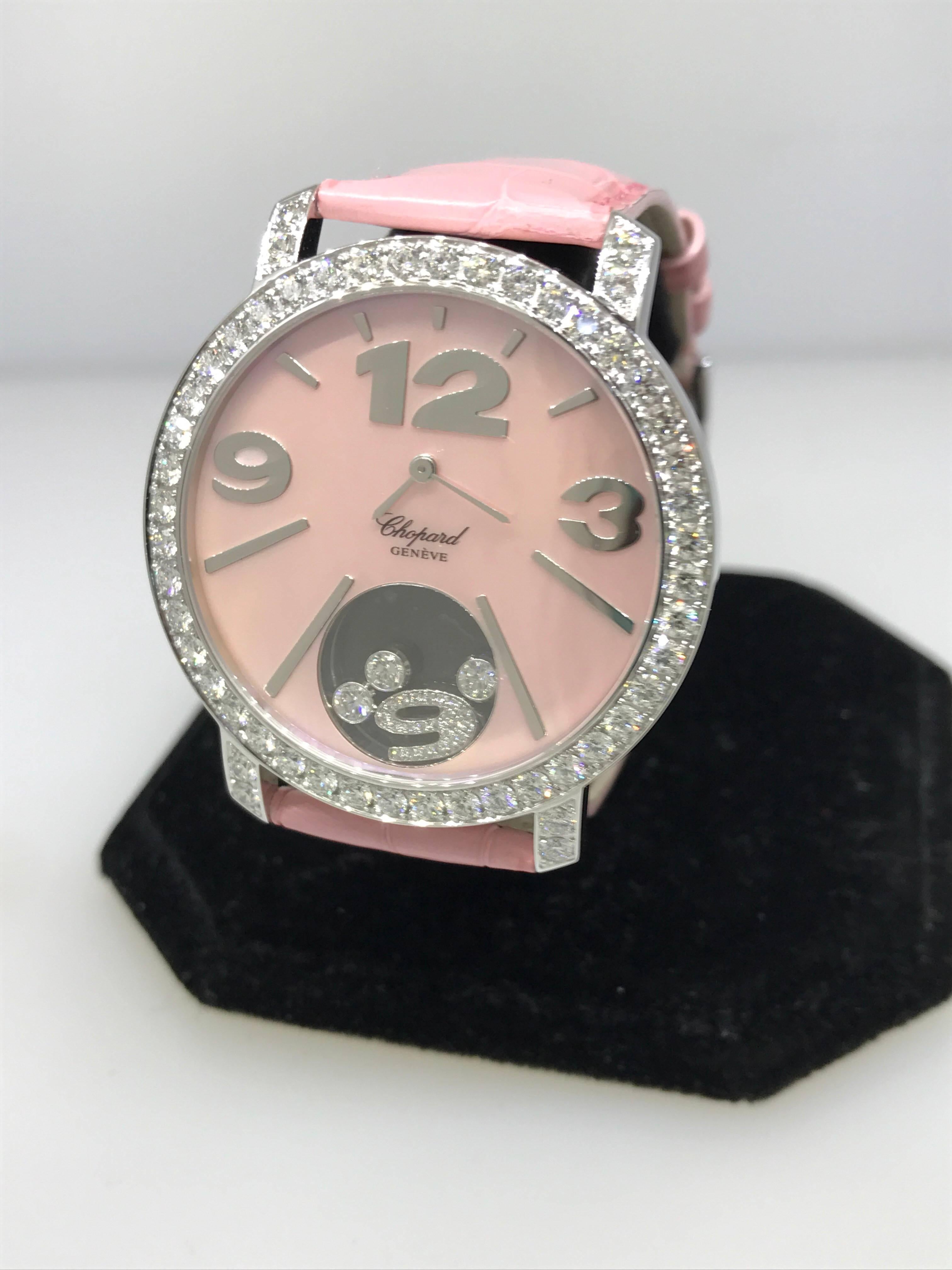 Chopard Ladies White Gold Diamond Happy Diamonds Pink Bezel Wristwatch In New Condition For Sale In New York, NY