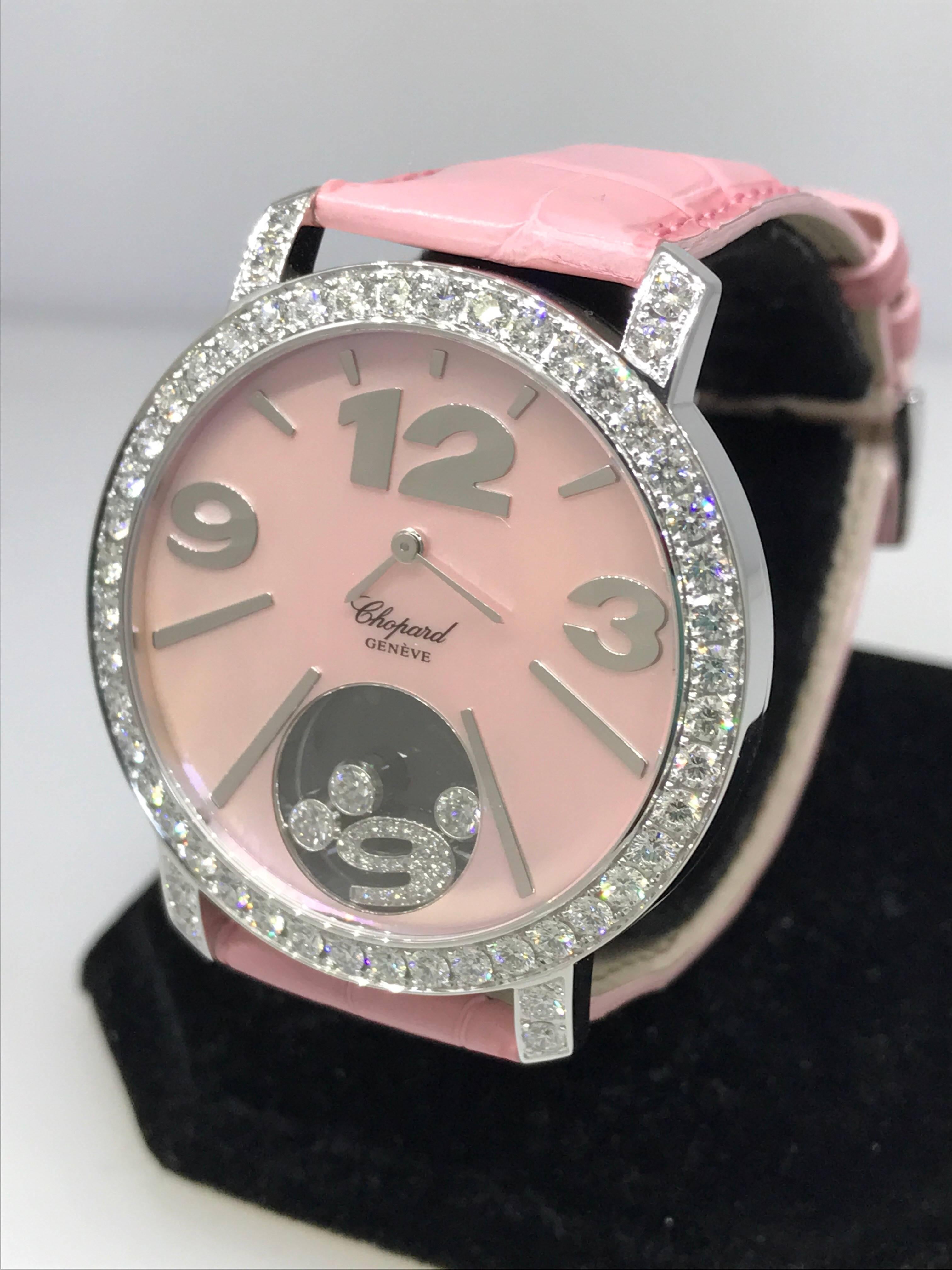 Chopard Happy Diamonds Lady's Watch 

Model Number: 20/7450-1005

100% Authentic

Brand New

Comes with original Chopard box, certificate of authenticity and warranty, and instruction manual

18 Karat White Gold Case and buckle (55.30gr)

Sapphire