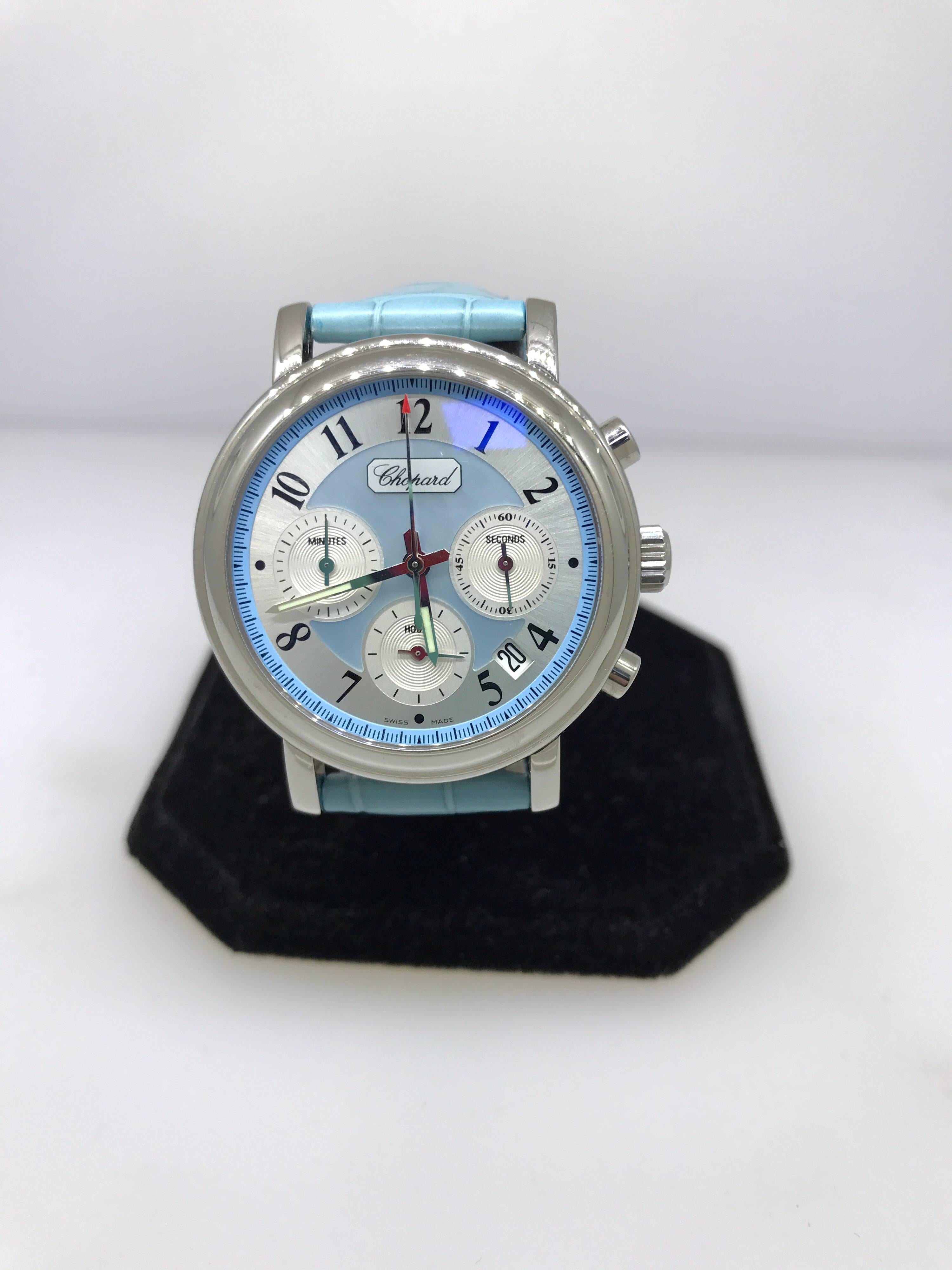 Chopard Mille Miglia Elton John Watch

Model Number 16/8331-3008

100% Authentic

New / Old Stock

Comes with instruction manual

Stainless Steel Case

Sapphire Crystal

Mother of Pearl and Light Blue Dial

Case Diameter: 38.5mm

Light Blue