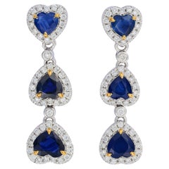 Wandelbare Ohrringe aus Platin mit Saphir im Herzschliff und Diamant-Halo – Fei Liu