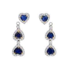 Wandelbare Ohrringe aus Platin mit Saphir im Herzschliff und Diamant-Halo – Fei Liu