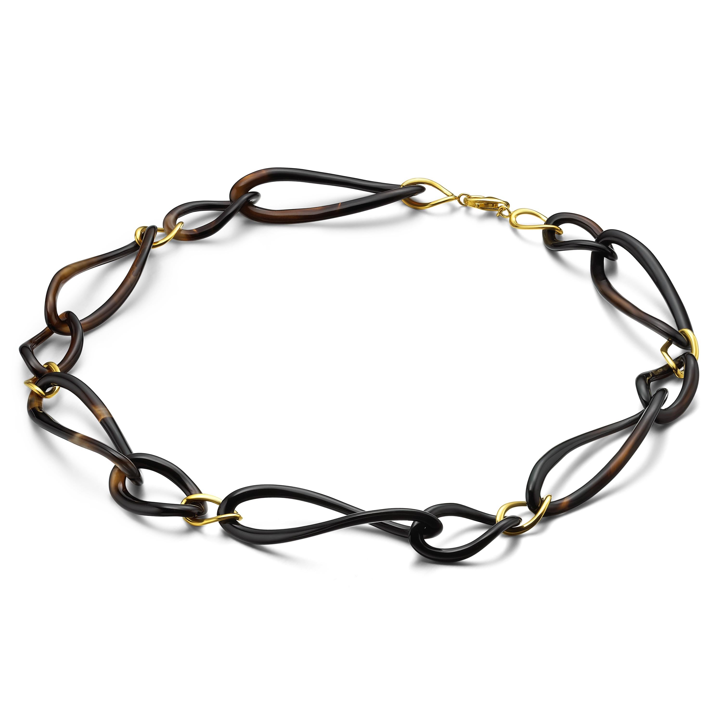 Description:
One-off black onyx link chain style necklace with 18ct yellow gold plate on sterling silver links.

Inspiration:
Onyx is a variety of the microcrystalline quartz, called chalcedony. The name 'chalcedony' comes from Calcedon or