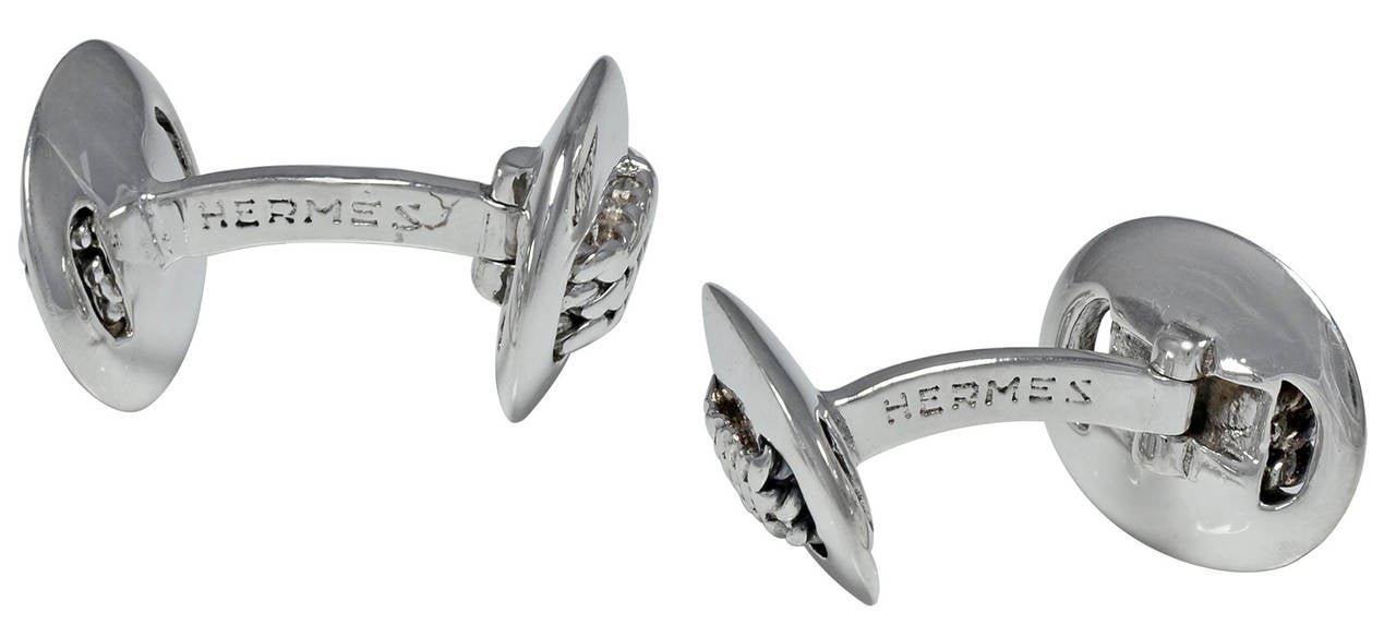 Sterling silver double-sided cufflinks.   Made and signed by HERMES.
Rope stitch motif.

Alice Kwartler has sold the finest antique gold and diamond jewelry and silver for over 40 years.