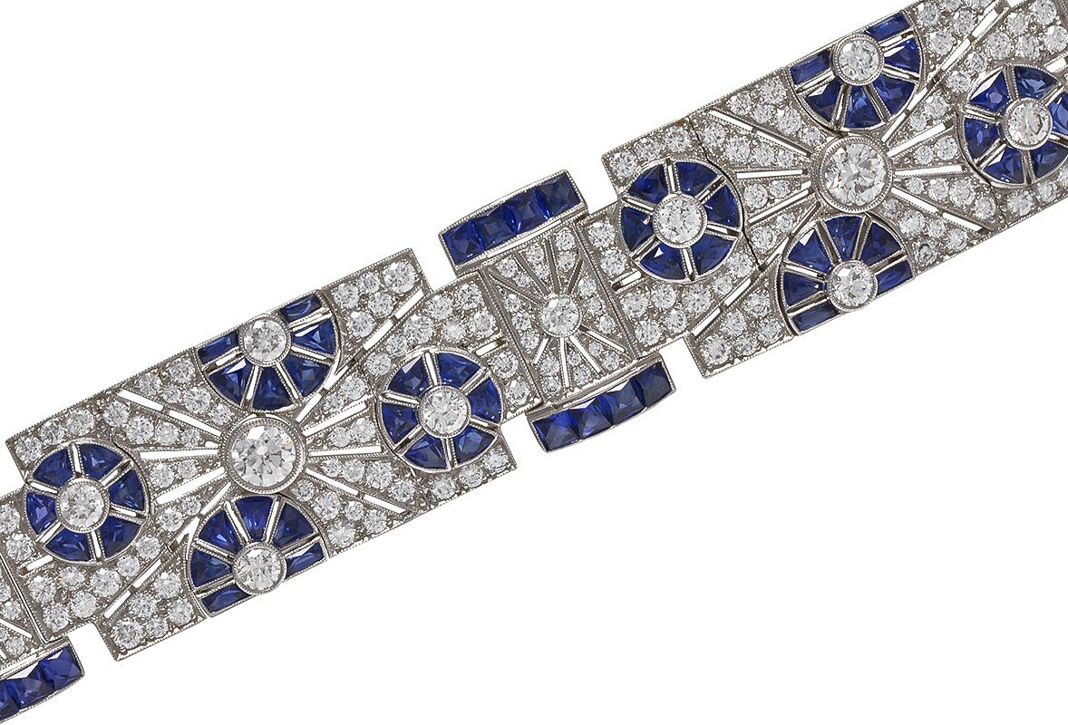 Gorgeous sapphire and diamond bracelet from KWIAT Vintage Collection.  Set in platinum.  8.0 cts of brilliant white diamonds (G-H color, VS1- VS2) and bright faceted sapphires in an art deco motif.  7