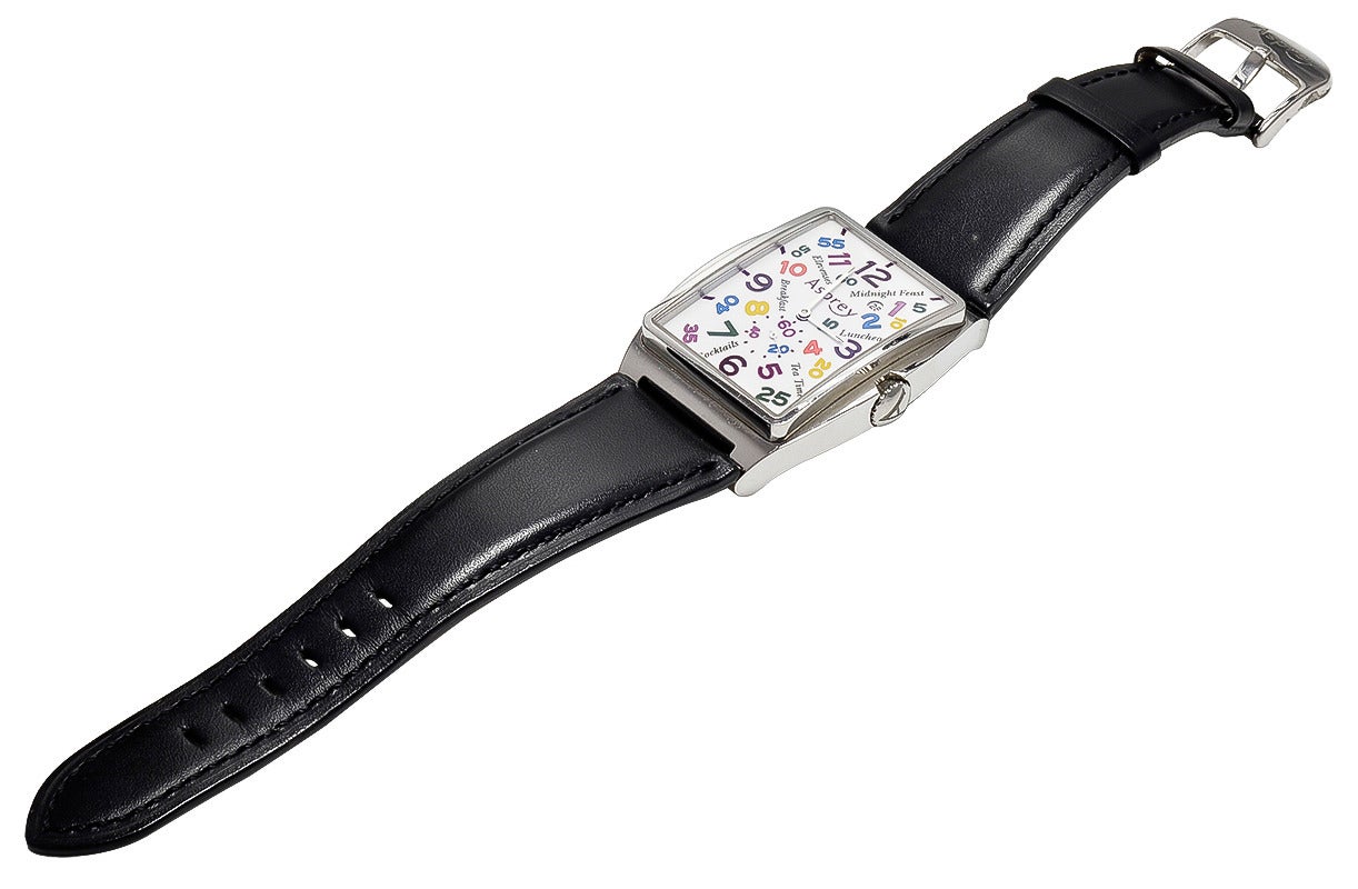 Fabulous extra-large stainless steel watch by Asprey.
Whimsical enamel letters and time-related activities. Automatic. 
2