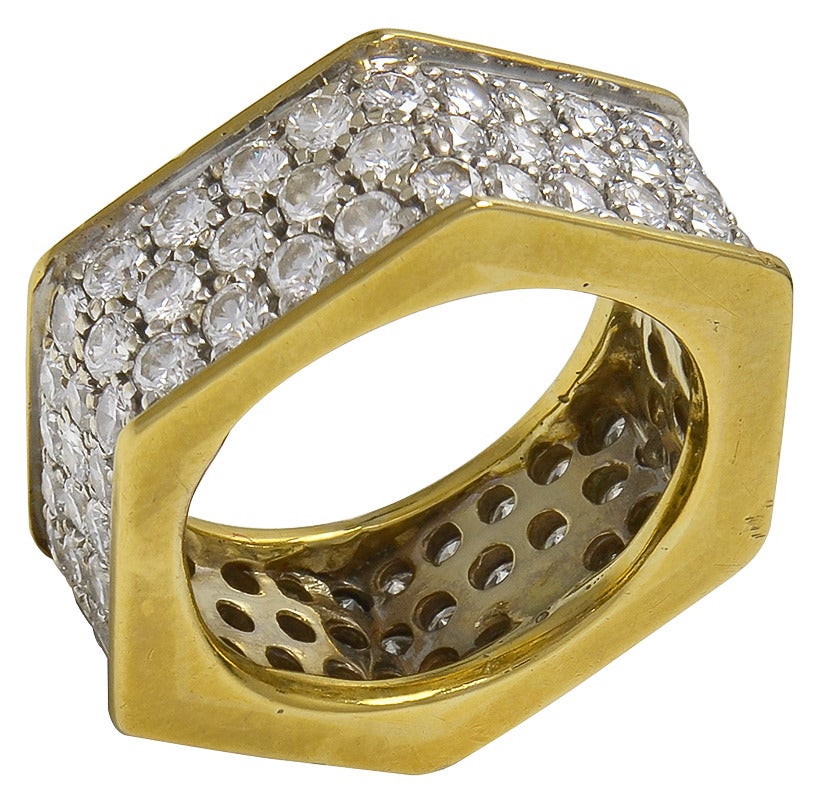 Striking 6-sided diamond band. 3cts of sparkling white diamonds set in 18k yellow gold.Very comfortable to wear. A beautiful distinctive look. Size 5.