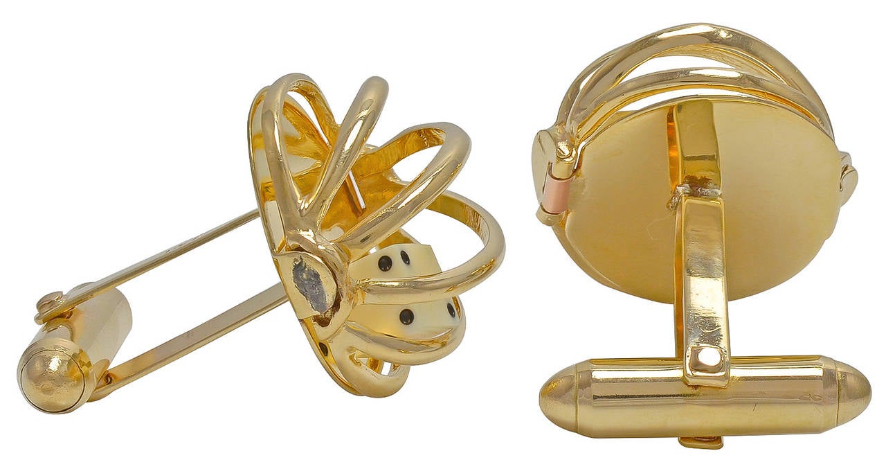 Festive cufflinks, 14k gold, with figural dice that move as you move your wrist.
Well done and fun,. A conversation piece.