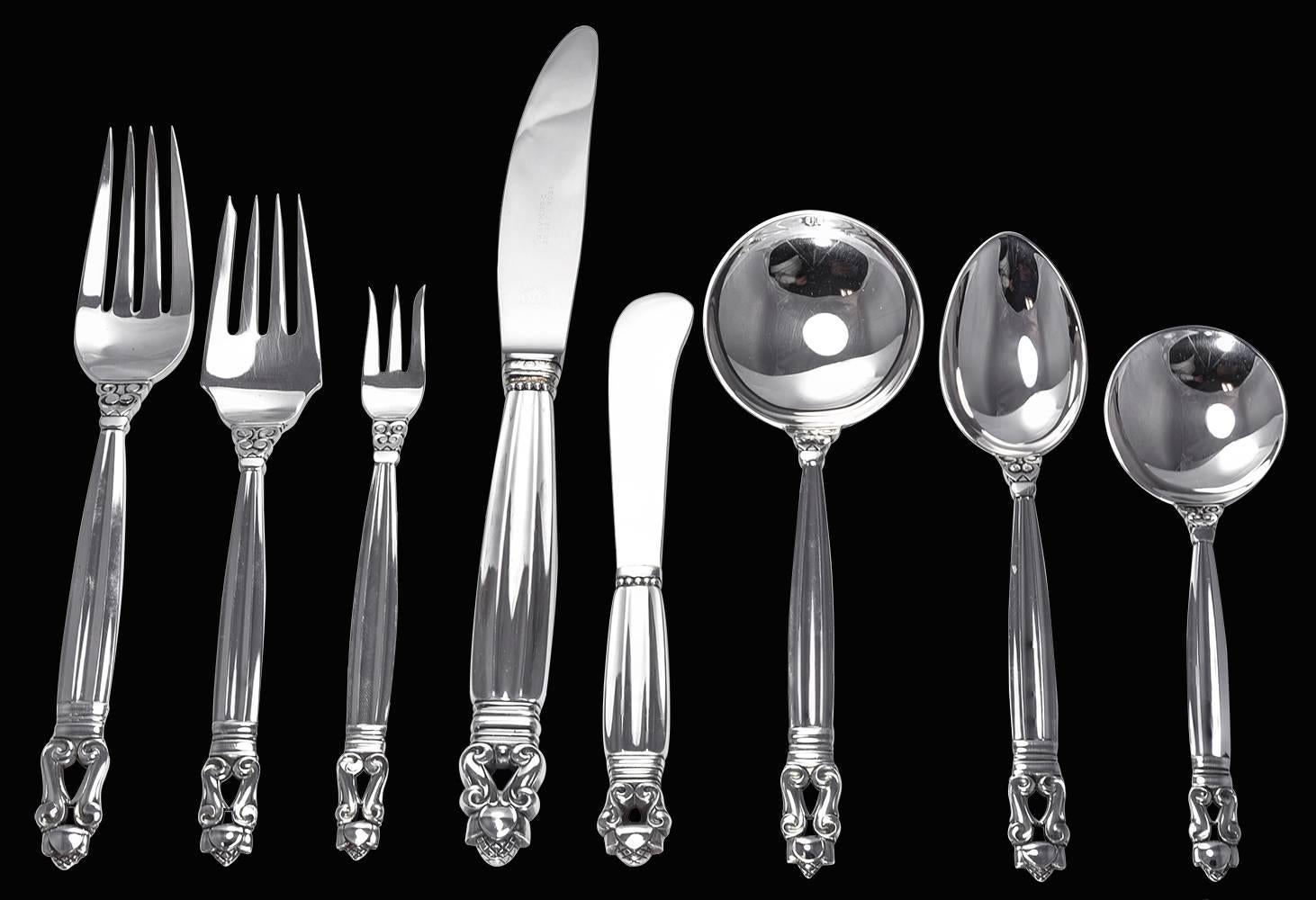 Large and complete sterling silver dinner set.  Made and signed by Georg Jensen in the 