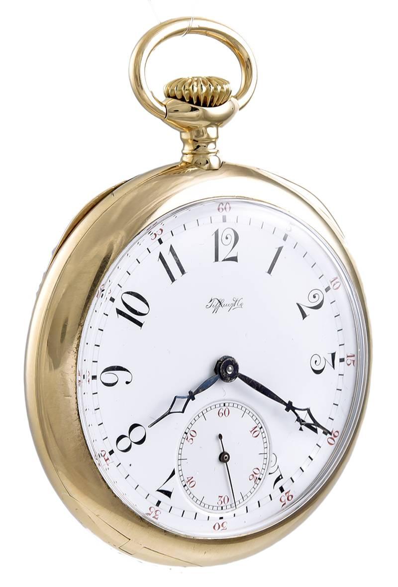 Pristine 18K gold pocket watch.  Made and signed by TIFFANY & CO. in the early 20th century.   Movement, case and dial signed by Tiffany.  The dial is in excellent condition, with black and red lettering.  Second hand.  Mechanical.  
2