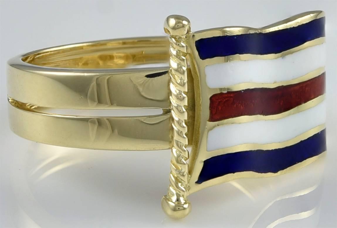 Red, white and blue enamel ring, which signifies the letter 