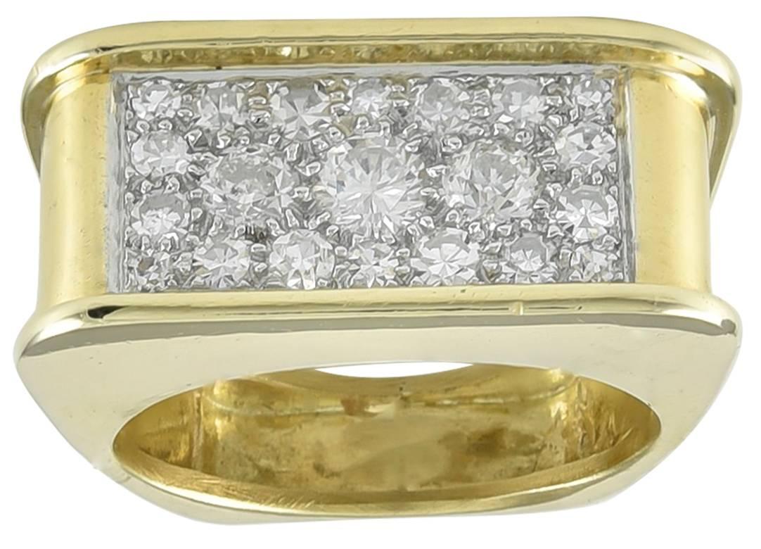 Very smart retro ring.  18K yellow gold, encrusted with 1.50 cts. of brilliant diamonds.  Tank style, squared off on top and rounded around the sides and back.  Size 5 1/2 an can be custom-sized.  A sculptured, stylish look.

Alice Kwartler has