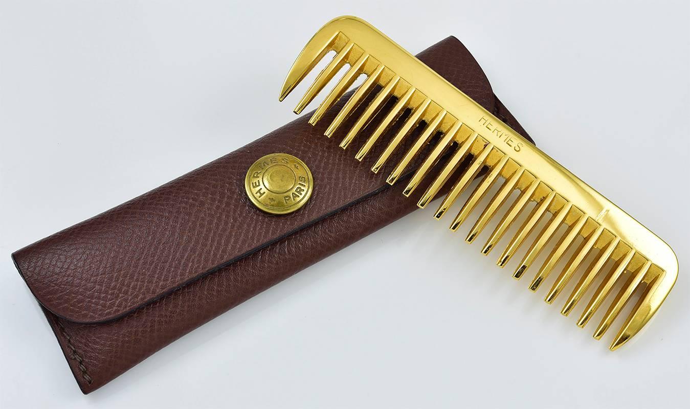 Brass moustache comb.  Made and signed by HERMES PARIS.  In original leather fitted case.   3 1/2