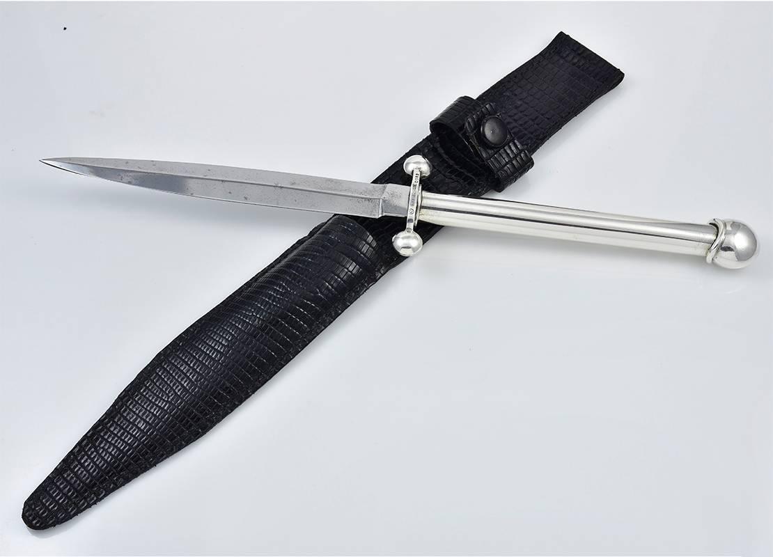 Dramatic and realistic sterling silver figural dagger letter opener.  Made and signed by B. KIESELSTEIN-CORD.  8 1/2