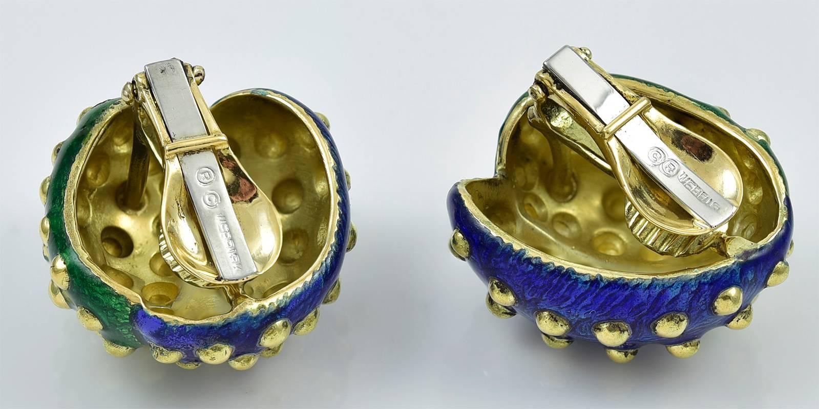 Very attractive ear clips.  Made and signed by DAVID WEBB. 18K yellow gold. Emerald green and sapphire blue enamel, with raised gold dots.  1