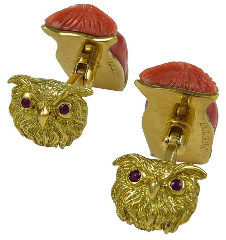 Superb figural owl cufflinks:  the fronts are carved coral figural owls; the flip  backs are owl heads with flashing ruby eyes.  18K yellow gold.  Made and signed by ZANNETTI.  3/4