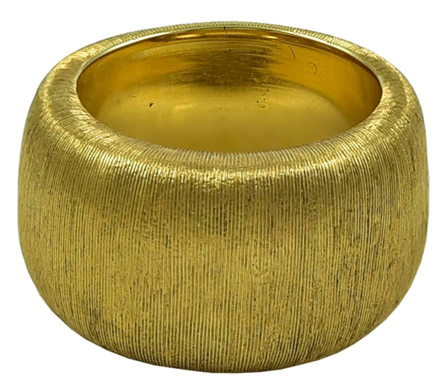 Superb 18K textured yellow gold ring; beautiful to look at and wear.  Made and signed by BIELKA.  Heavy gauge gold, tapering slightly in the back for comfort.    Size 5.  Bielka is a well known craftsman who gained notoriety after his apprenticeship