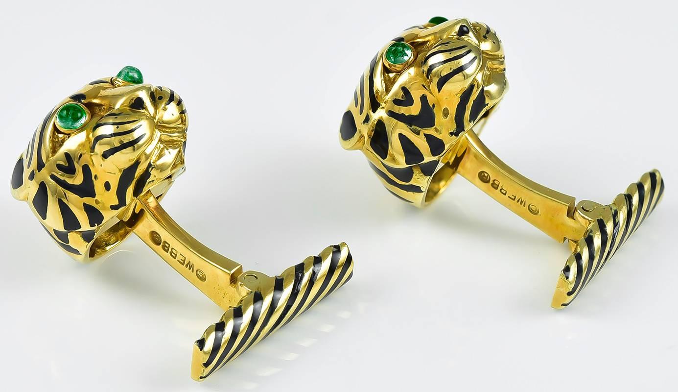 Full of personality figural tiger head cufflinks. Made and signed by DAVID WEBB.
18K yellow gold, with enamel stripes, on front and on flip-up back bar.  Cabochon emerald eyes.  Most appealing.

Alice Kwartler has sold the finest antique gold and