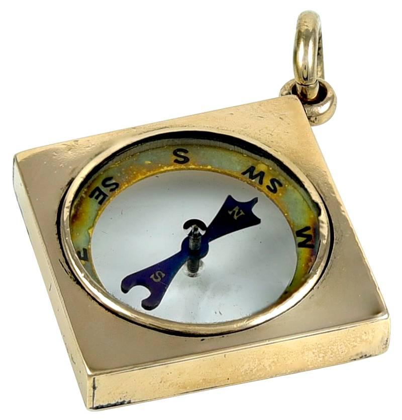 Very interesting diamond-shaped compass charm.  14K yellow gold.  1