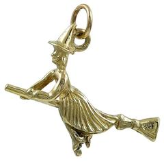 Antique Witch on a Broom Stick Gold Charm