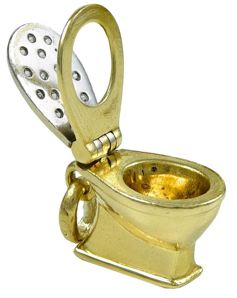 Great charm!  A figural bidet, in 18K yellow gold, encrusted with brilliant diamonds. 1/2