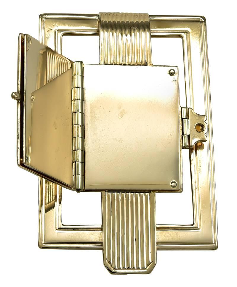 Very handsome art deco money clip.  Fine engraved stripes on front and back.
Solid 14K yellow gold.  Opens to reveal six 