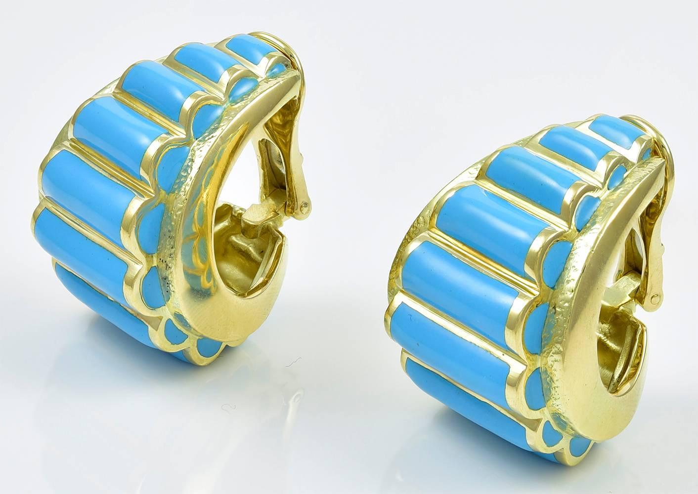 Gorgeous large ear clips.  Made and signed by DAVID WEBB.  18K yellow gold with turquoise enamel.  An attractive contrast between shiny and satin gold.   Omega clips.  1 1/4