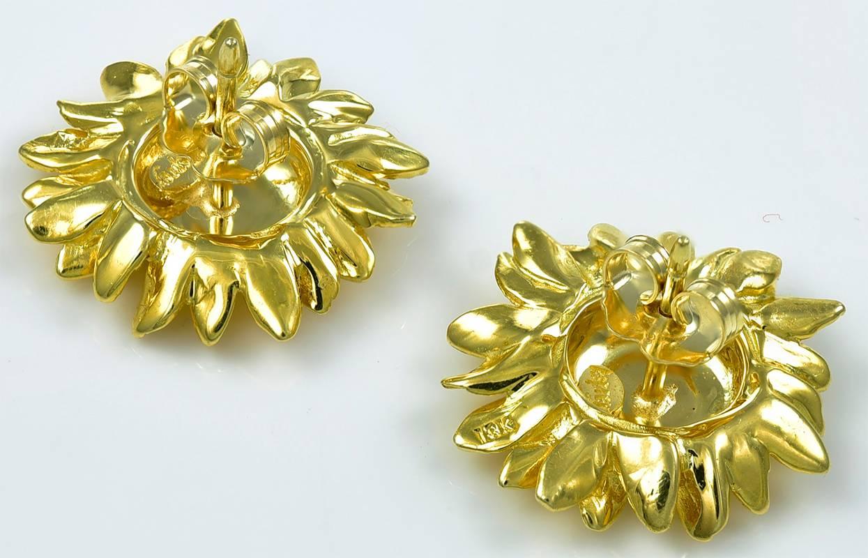Iconic figural "Sunflower" earrings.  Made and signed by ASPREY.  18K yellow gold.  3/4" in diameter.  Set with a post.  A classic earring.

Alice Kwartler has sold the finest antique gold and diamond jewelry and silver for over forty