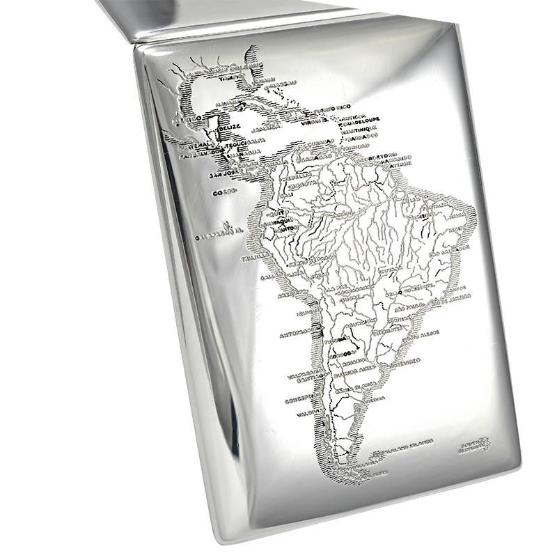 Sterling silver hinged cigarette case.  Signed by TIFFANY & CO.  Shows a detailed map of South America.  4 1/2" x 3 1/4."  Heavy gauge silver.  Lemon gilt interior, with double bars.  A fine and unusual map case.

Alice Kwartler has