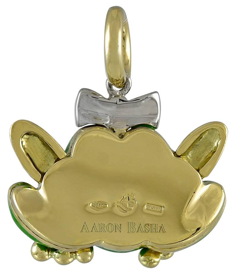 Adorable figural princess frog charm.  Made and signed by AARON BASHA.  Heavy gauge 18K yellow gold, with green, white and black enamel.  Set with a diamond bow.  1" x 2/3."  Most appealing!

Alice Kwartler has sold the finest antique gold