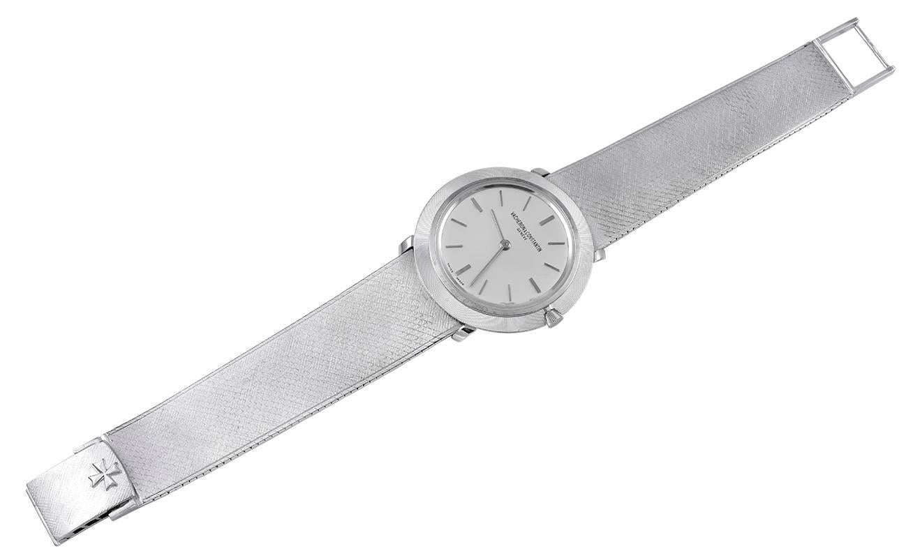 Timeless and elegant day to night wrist watch.  Made and signed by VACHERON CONSTANTIN.  18K white gold.  Stick markers.  movement.  Ultra-thin dusemme movement.  Case size is 33mm.  Solid satin finish woven mesh bracelet; 7" long and tapers
