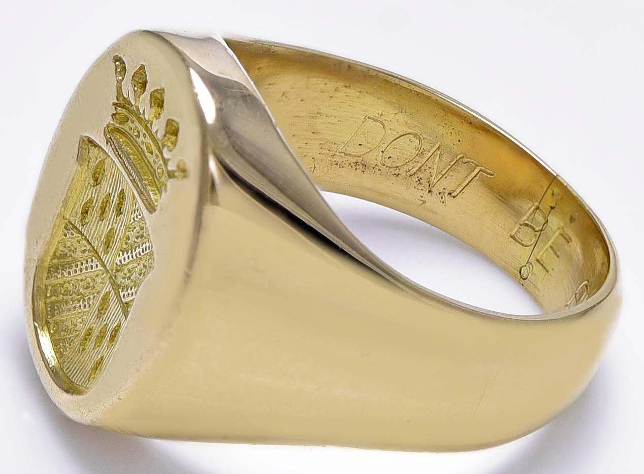 Superb antique crest ring.  Made, signed and numbered by CARTIER PARIS.  A well-detailed crest on top.  Inside is the engraved message:  "Don't Be Afraid.".18K  mellow yellow gold.  Size 5 and can be custom sized.  A great message, a great