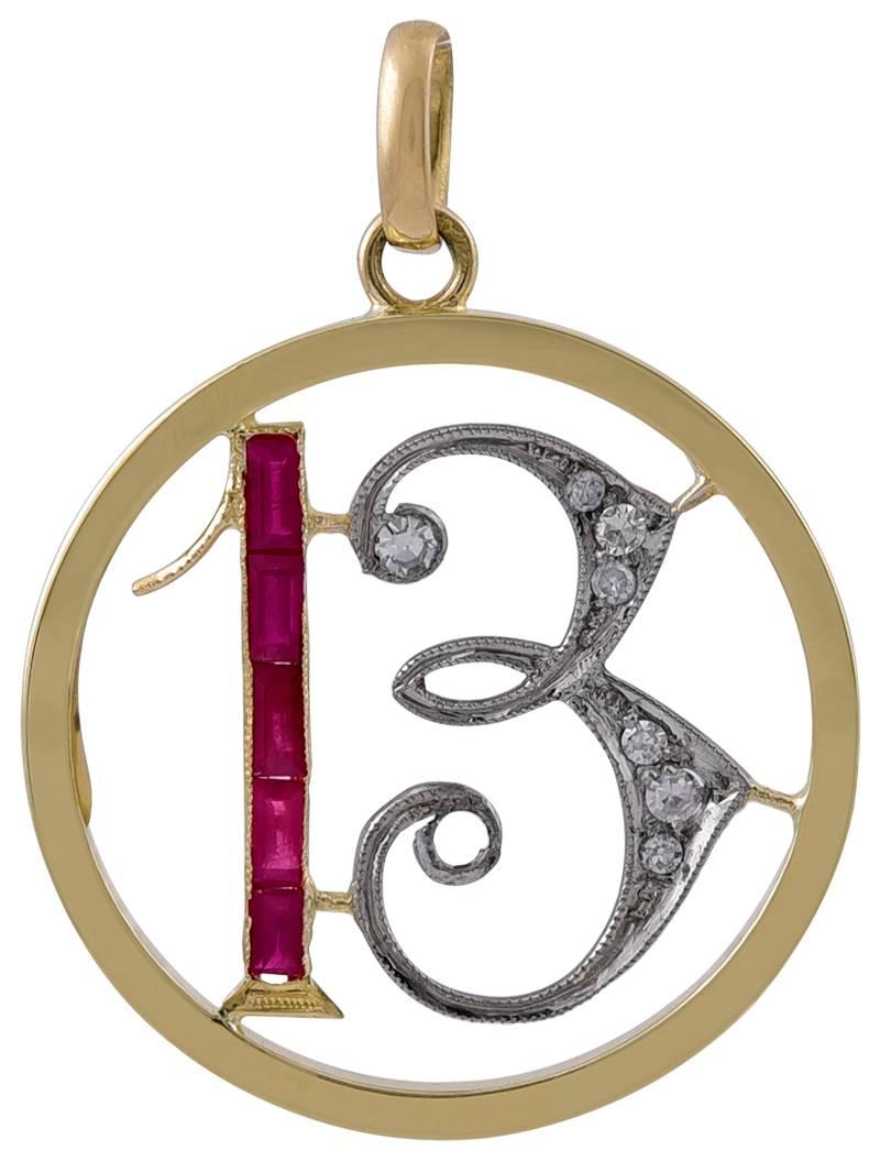 Late Victorian figural "13" charm.  14K yellow gold, set with gemmy rose-cut diamonds and brilliant calibre-cut rubies.  Beautifully set and made.  3/4" in diameter.

Alice Kwartler has sold the finest antique gold and diamond jewelry