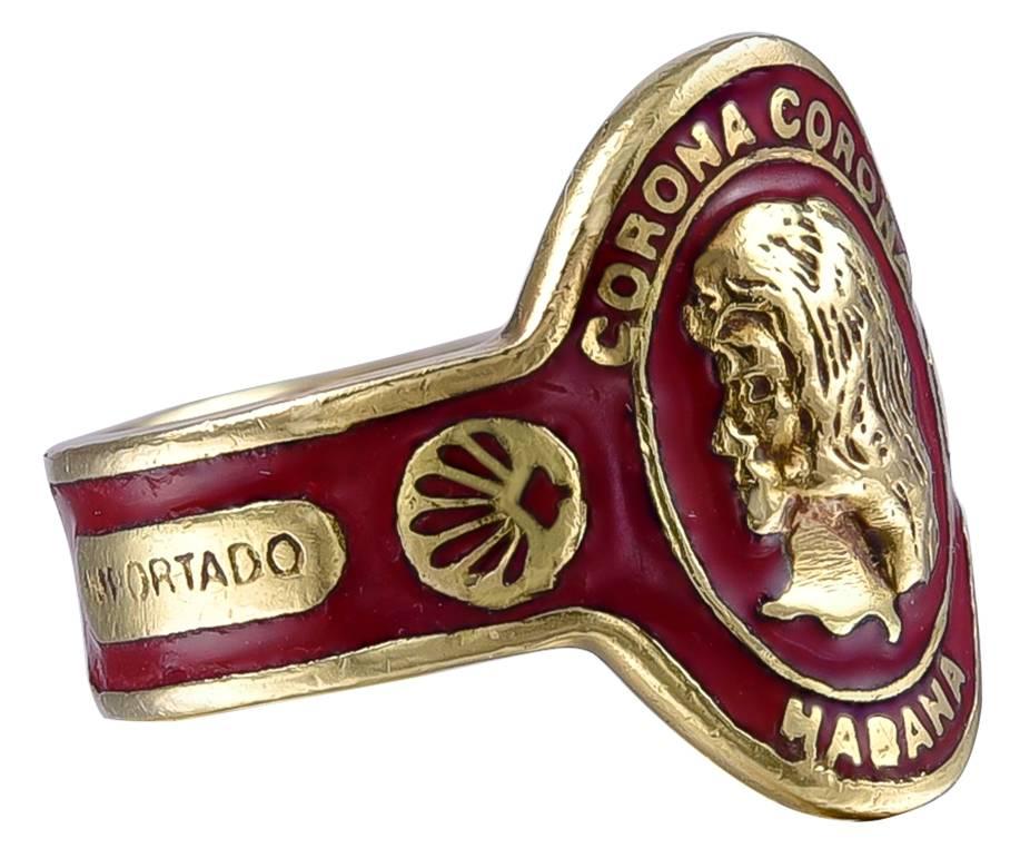 18K gold and red enamel "cigar band" ring.  Made, signed and numbered by CARTIER.  Corona Corona Habana Importado.    Size 6.  Superb condition.

Alice Kwartler has sold the finest antique gold and diamond jewelry and silver for over forty