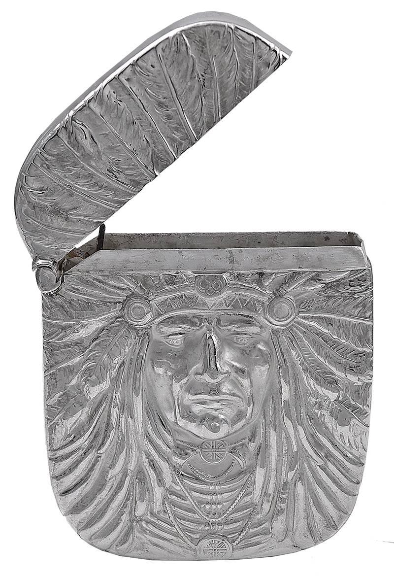 Sterling silver hinged match safe.  The front of the case is a figural "Indian Head" in full feather regalia.  Carved in deep relief, with engraved detailing.  Made and signed by UNGER BROTHERS.  Crisp beautiful condition.  1 7/8" x 2