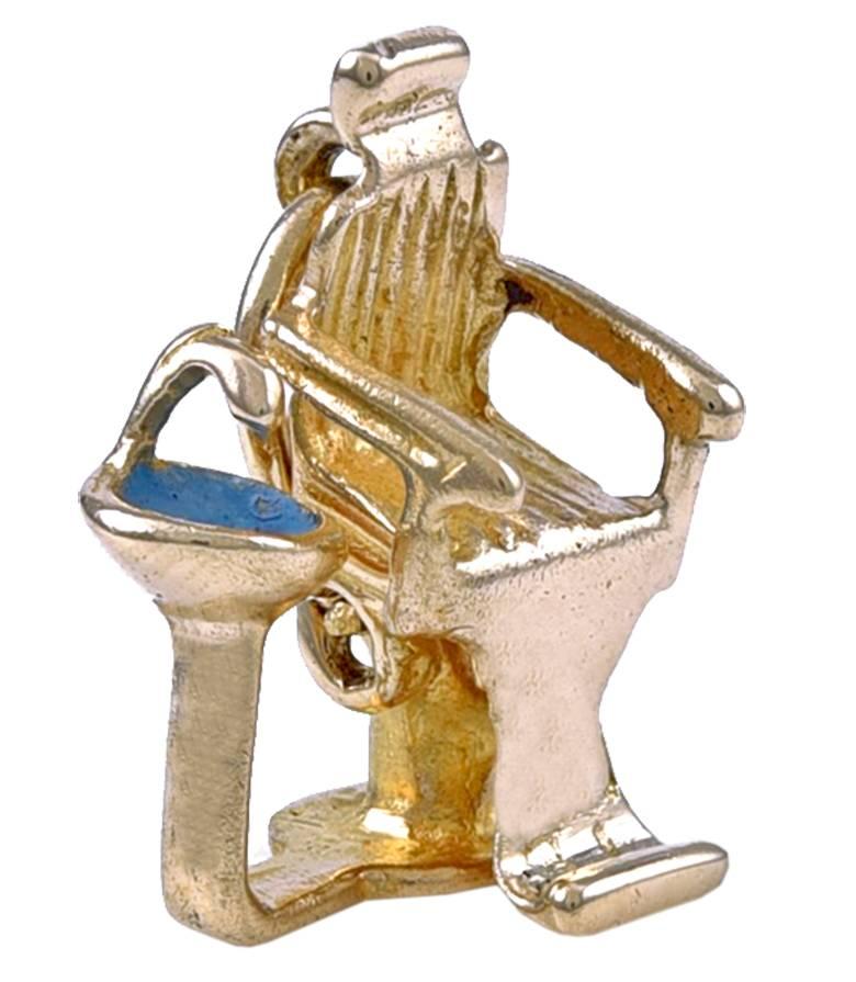 Rare charm:  a figural "dentist's chair."  14K yellow gold with an attached blue enamel bowl.  The chair is hinged, so it can lean back..  3/4" x 1/2."  

Alice Kwartler has sold the finest antique gold and diamond jewelry and