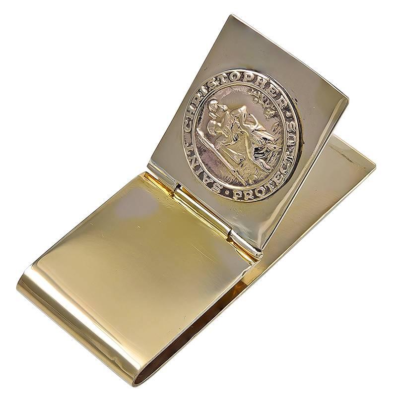 Heavy gauge 14K  money clip, with an applied St. Christopher's medallion.  Made with a strong hinged locking mechanism.  2 1/4" x 7/8."   Most handsome and distinctive.

Alice Kwartler has sold the finest antique gold and diamond jewelry