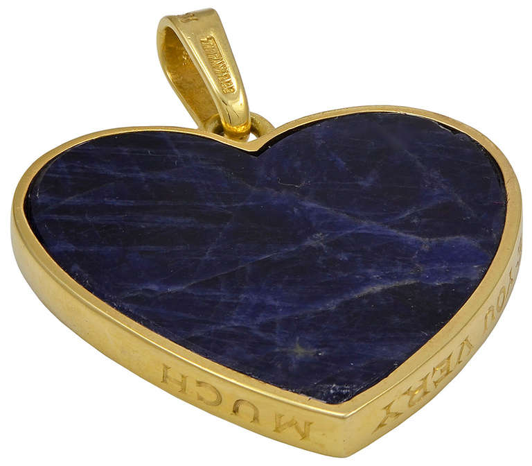 Beautiful double-sided lapis figural heart pendant.  Made and signed by 
Tiffany & Co. in 18k yellow gold.  1 1/4