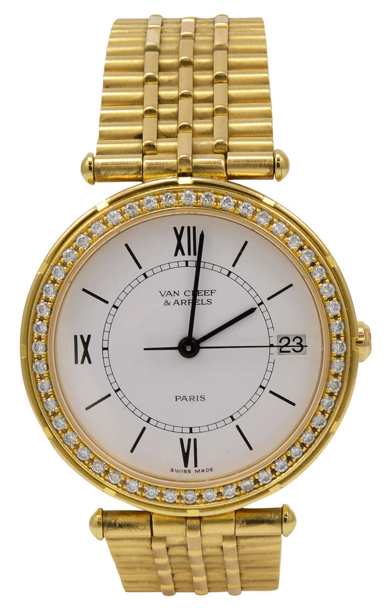 Van Cleef & Arpels lady's 18k yellow gold and diamond wristwatch with bracelet. Easy to read white dial with Roman numerals, center seconds and date. Heavy 18k gold bracelet with deployant buckle. Quartz movement.
Superior chic and wearable