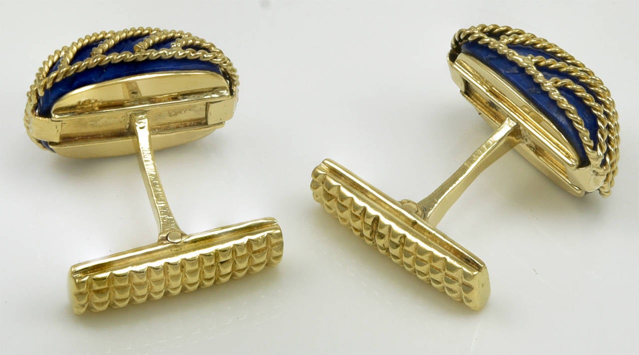 Impressive sugar loaf lapis cufflinks. Made and signed by Tiffany & Co. 
18K yellow gold with diagonal gold stripes across the lapis.

A bold, polished look.

Alice Kwartler has sold the finest antique gold and diamond jewelry and silver for