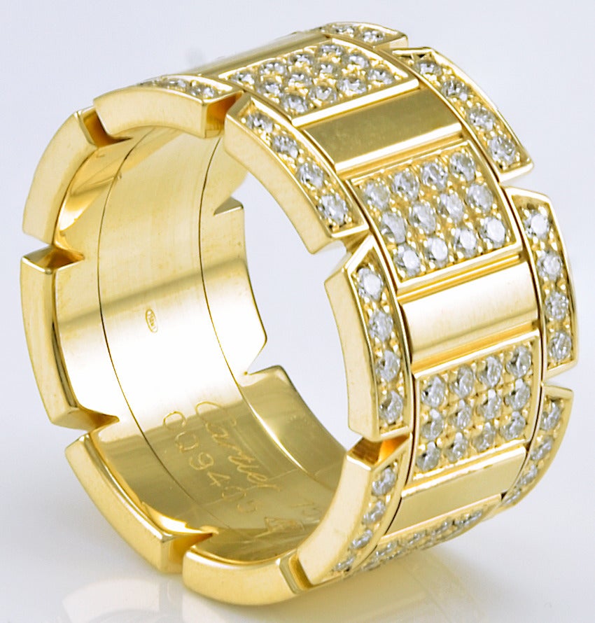 Bold and beautiful large model Tank Francaise ring. Made, signed and numbered by Cartier. Over 2.5cts of diamonds. ( F color, VVS1 clarity)

Set in 18k yellow gold. European size 55,  or 7 1/4 US size. 13mm wide. A beautiful ring to look at, very