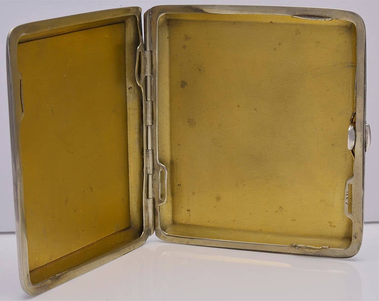 Most handsome silver case with beveled border.
Entire face of case shows an enamel portrait of an alert Jack Russell terrier.
Beautiful and pristine enameling. Fine engraved crest on reverse side.
A rare desirable subject.